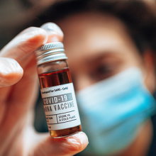 Pharmacist holding the Covid19 vaccine vials